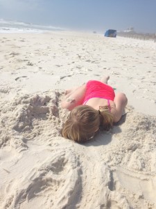 Abby dug a hole in the sand right up to her armpit and the hole was nowhere near collapsing in on itself.  Amazing sand!